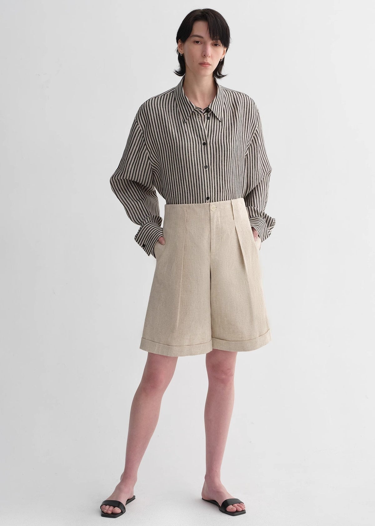 Sophisticated linen waistless pleated wide-leg cropped pants for women, featuring architectural silhouette, textured side pockets-4