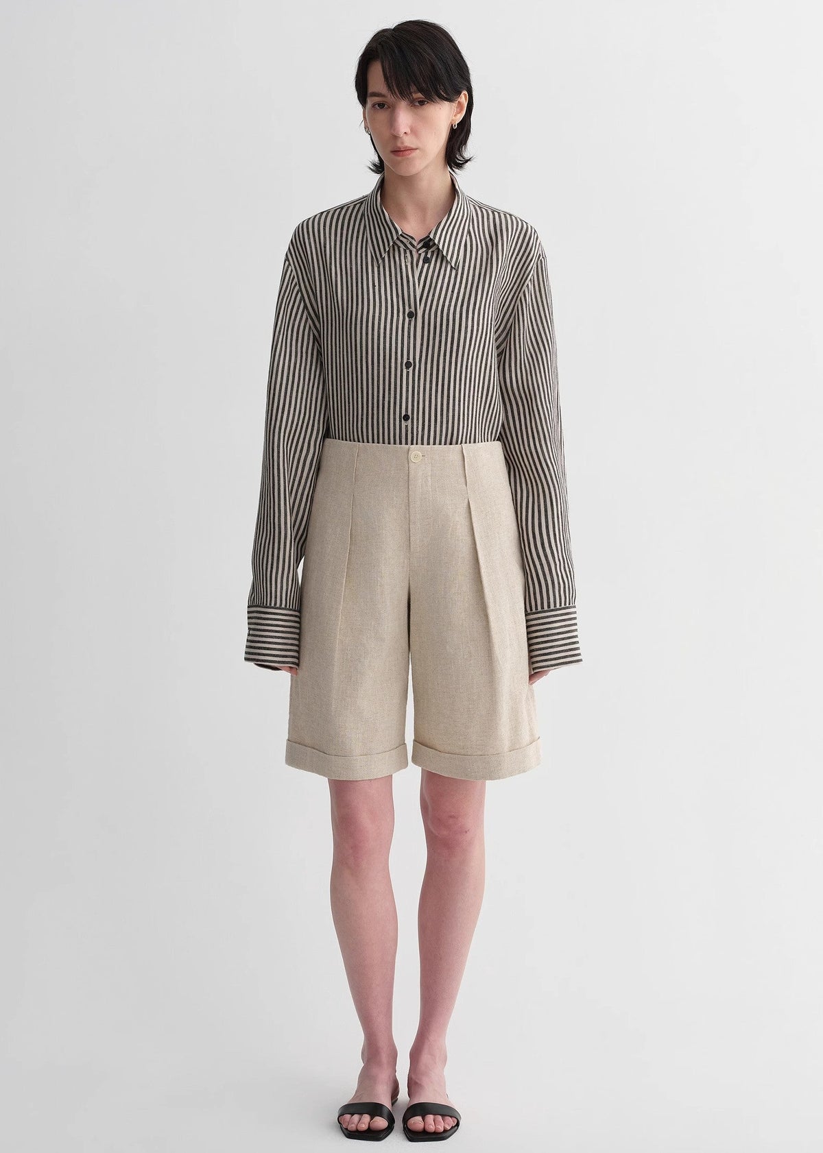 Sophisticated linen waistless pleated wide-leg cropped pants for women, featuring architectural silhouette, textured side pockets-0