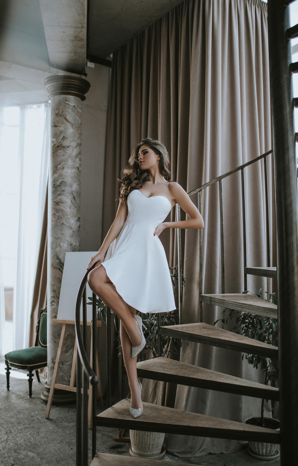 Handmade ivory wedding dress with off-shoulder design and lace-up back