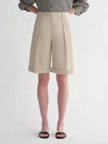 Sophisticated linen waistless pleated wide-leg cropped pants for women, featuring architectural silhouette, textured side pockets-1