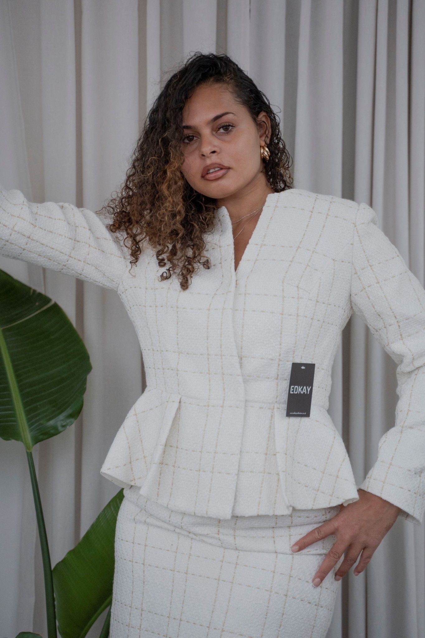 The pleated-peplum plaid tweed skirt suit (UK size 14)-1